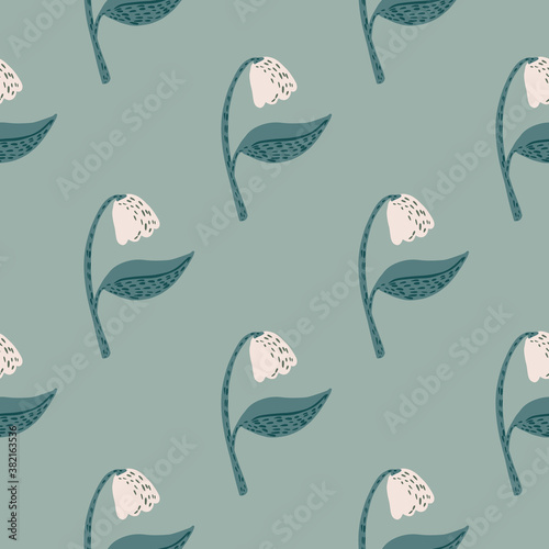 Campanula flower silhouettes seamless pattern. Spring stylized floral print with light buds and soft blue background.