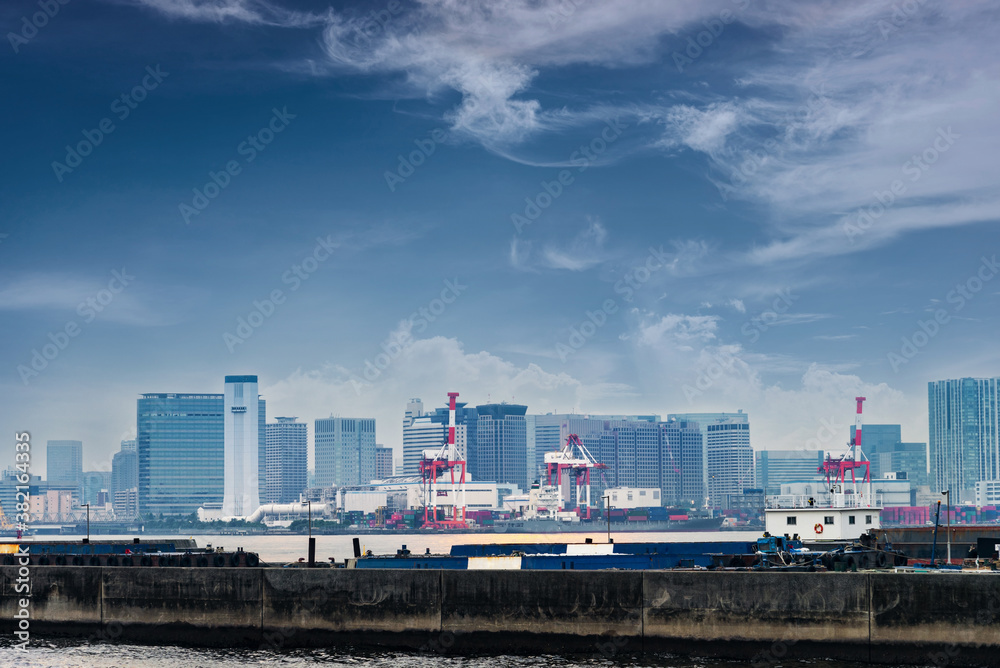 Tokyo bay skyline with modern skyscraper building cityscape at Odaiba Seaside Park, Odiaba, Tokyo, Japan