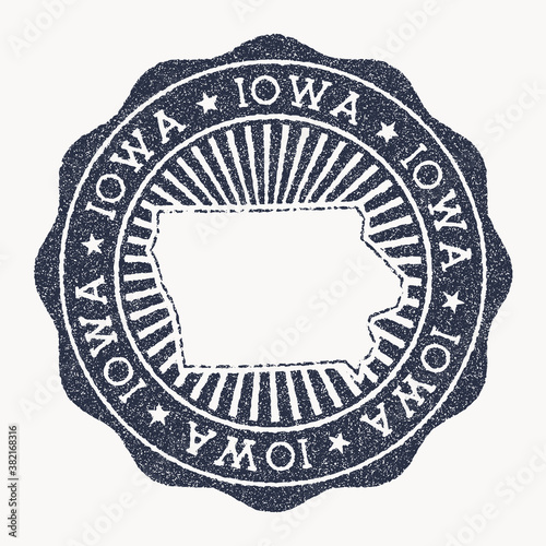 Iowa stamp. Travel rubber stamp with the name and map of US state, vector illustration. Can be used as insignia, logotype, label, sticker or badge of Iowa.