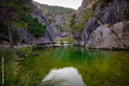Entrance to the protected natural area of Parrizal, a route that goes up the Matarraña river to the Els Estres canyon where it is born in the mountains of dels Ports, Beseit, Matarranya, Aragón, Spain