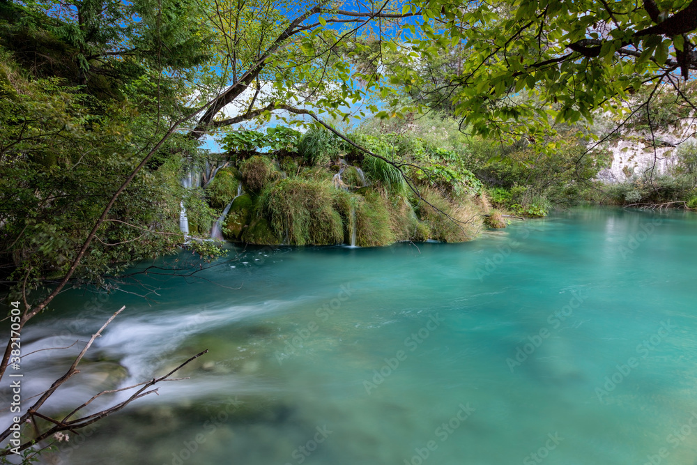 Naklejka premium Picture of a waterfall in the Plitvice Lakes National park in Croatia with long exposure during daytime