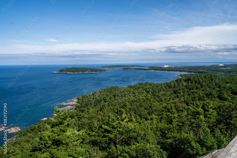 View of Lake Superior from atop Sugarloaf Mountain in Michigan in summer