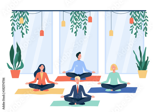 Happy office workers doing yoga, sitting in lotus pose on mats and meditating. Employees exercising during break. For mindfulness, stress relief, lifestyle concept