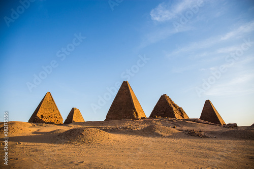 Pyramids in Sudan at daylight with clouds photo