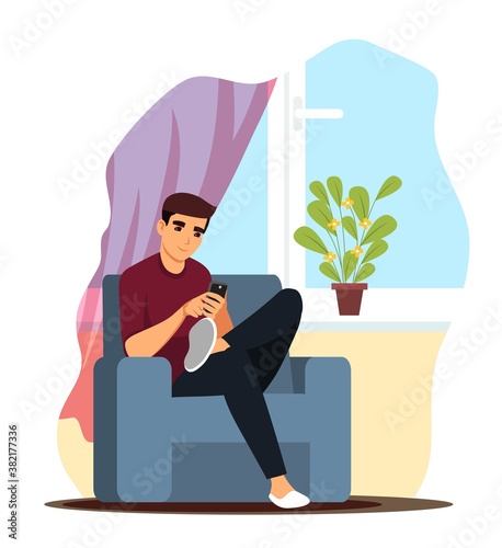 Man looking at phone, resting at home. Young guy sitting with mobile phone in armchair. Weekend activities vector illustration. Rest and relaxation, trendy modern lifestyle indoor