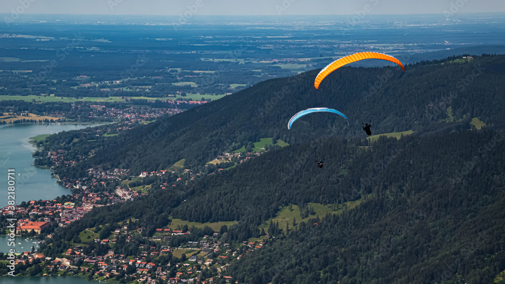 Beautiful alpine view with paragliders at the famous Wallberg, Rottach-Egern, Tegernsee, Bavaria, Germany Beautiful alpine view with paragliders at the famous Wallberg, Rottach-Egern, Tegernsee, Bavaria, Germany