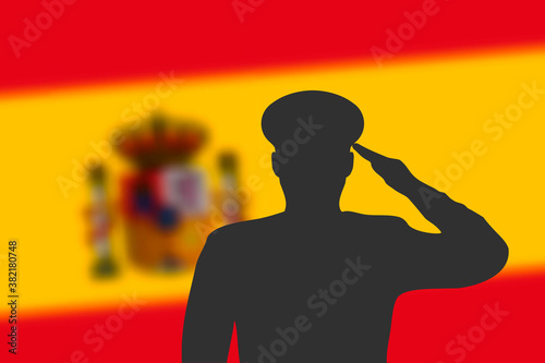 Solder silhouette on blur background with Spain flag.