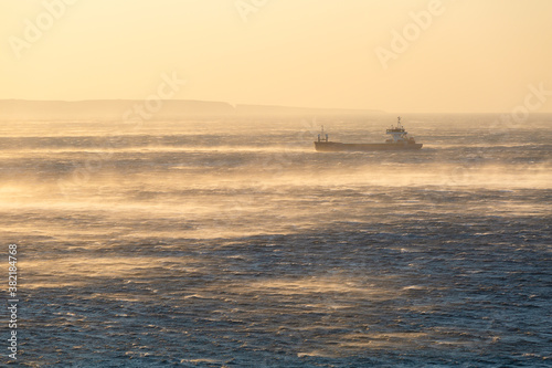 Cargo ship in Libyan sea near Goudouras village in eastern Crete. photo