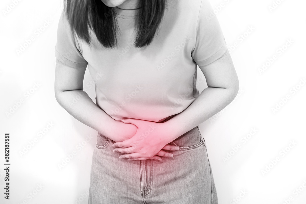 white isolated portrait stomach ache sick and pain feeling of woman 30s to 40s with monochrome and red spot on hurt point white isolated portrait stomach ache sick and pain feeling of woman 30s to 40s with monochrome and red spot on hurt point