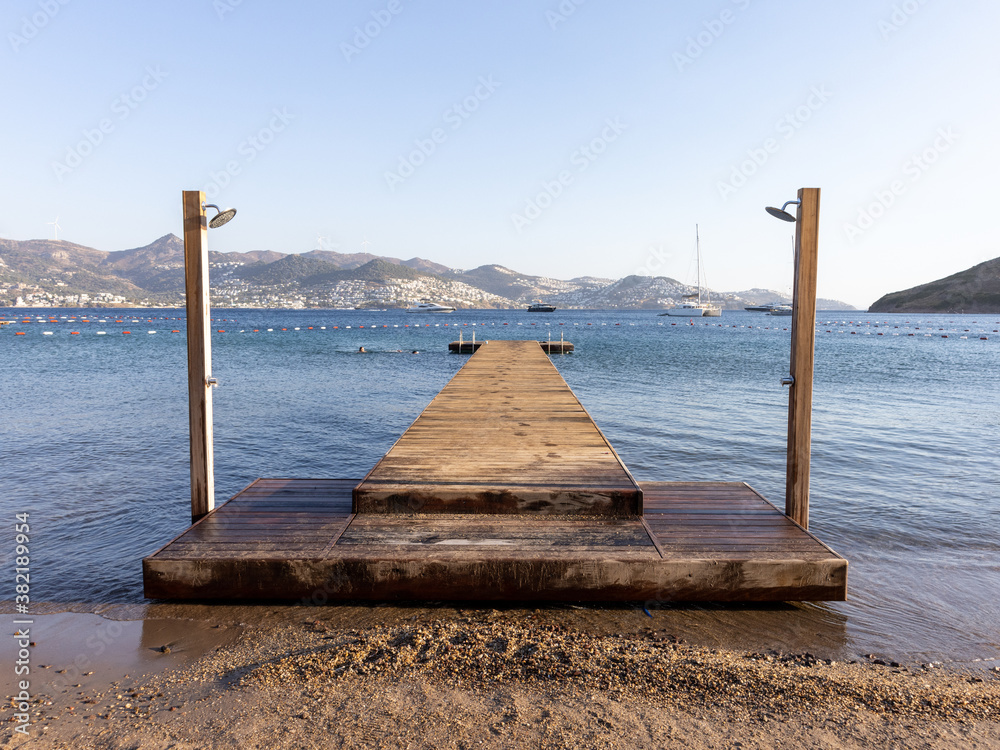 Fototapeta premium Season end in Aegean sea, quiet wooden pier