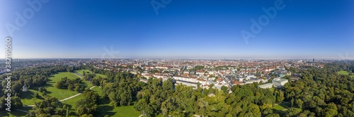 Panoramic aerial drone picture of Munich taken from English garden in the morning time