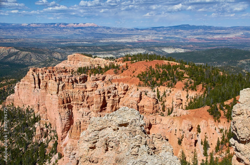 walking the rim of Bryce Canyon on a sunny day