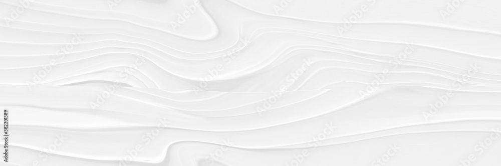 Blurred white background with elements of circles. The texture of volumetric figures for a screensaver or wedding card. Blur with space design. Blurred white background with elements of circles. The texture of volumetric figures for a screensaver or wedding card. Blur with space design.