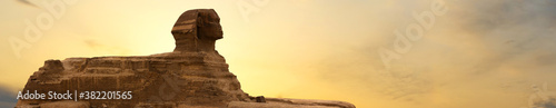 Sphinx against the backdrop of the great Egyptian pyramids. Africa  Giza Plateau