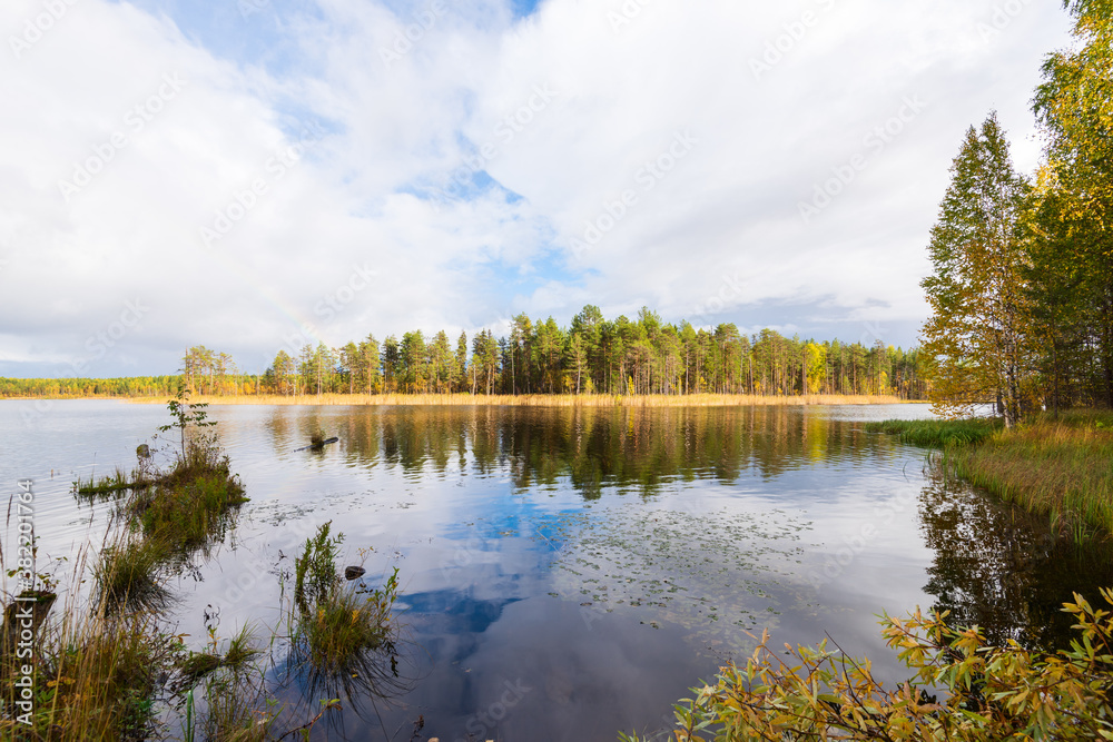 Lake in the Arkhangelsk region, northern Russia. Cloudy autumn weather