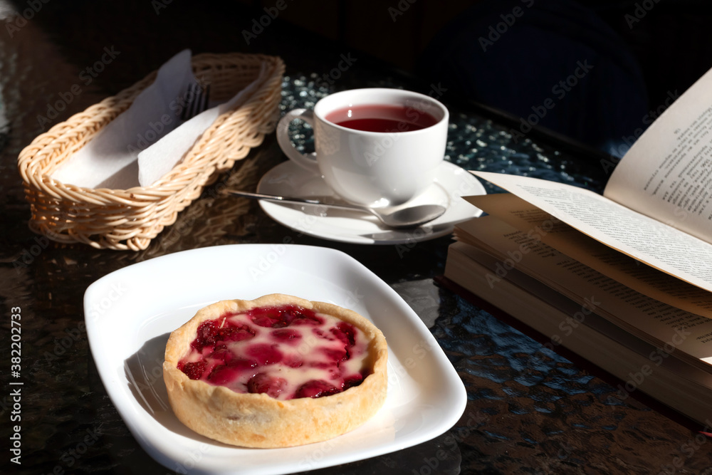 Morning the cafe, cup of espresso and berry dessert. Morning the cafe, cup of espresso and berry dessert.