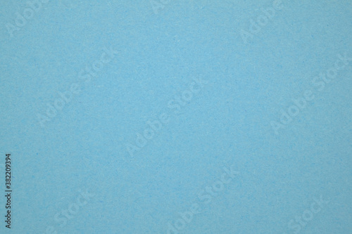 A dense industrial sheet of paper with a textured surface