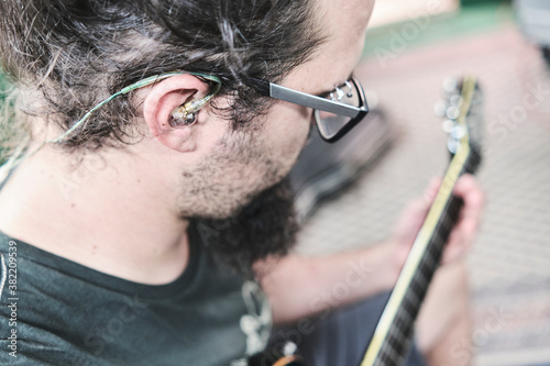 Close-Up Of Man Playing Guitar © Angel Santana