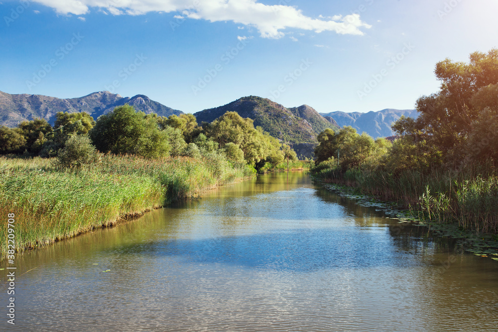 Lake and mountains in an ecological reserve - nature park with fishing Lake and mountains in an ecological reserve - nature park with fishing