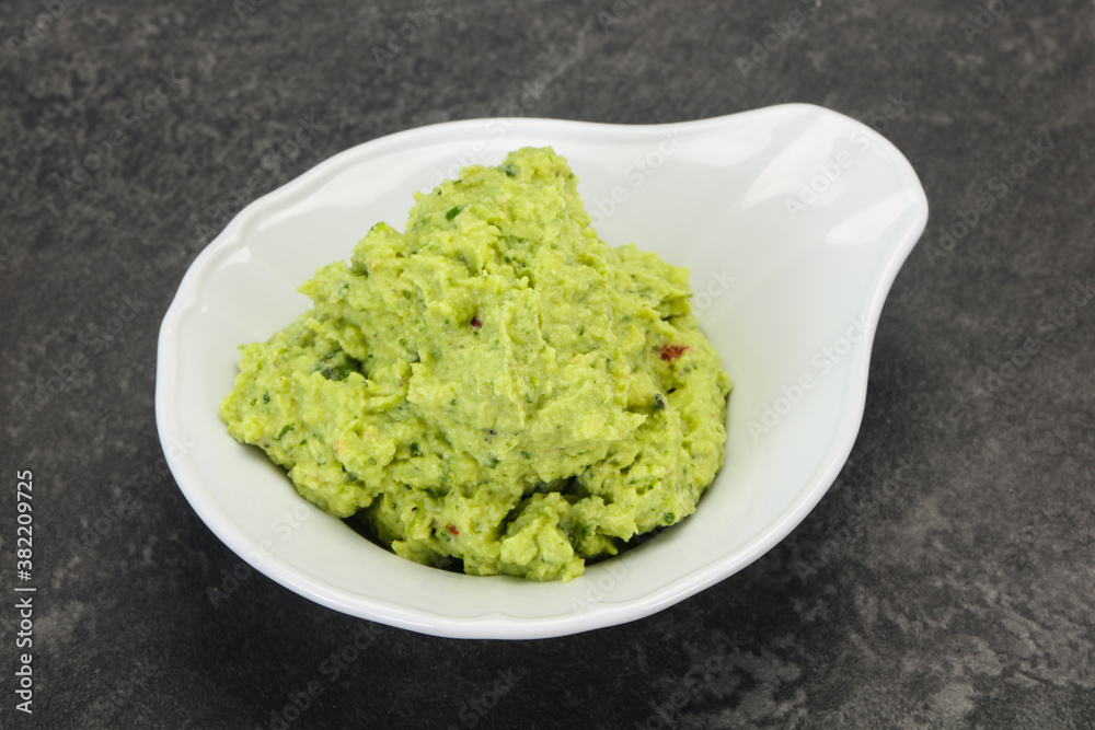 Avocado guacamole sauce with chili pepper