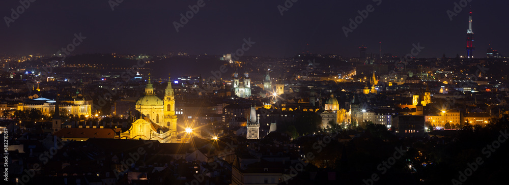 Prague - The panorama of the city with the Charles bridge and the Old Town at night.