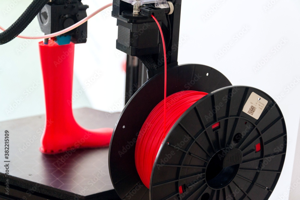 3d printer printing plastic last shoe prototype from red filament - obrazy, fototapety, plakaty 