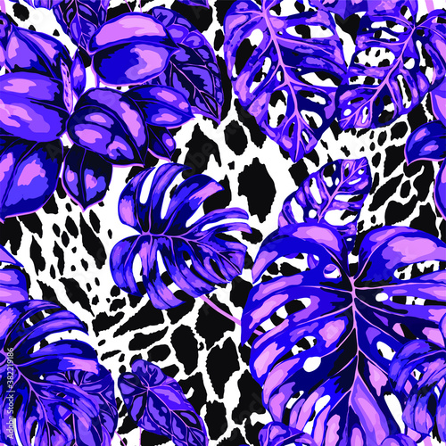 Tropical seamless pattern on animalistic texture. Jungle exotic summer print. Summer tropical leaf. Tropical flower fashion pattern. Floral tropic illustration. Vector seamless pattern.