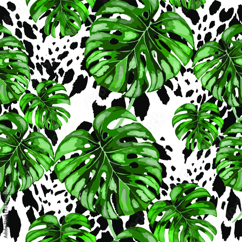 Tropical seamless pattern on animalistic texture. Jungle exotic summer print. Summer tropical leaf. Tropical flower fashion pattern. Floral tropic illustration. Vector seamless pattern.