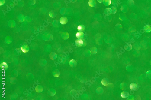 Abstract green blurred background. Christmas and New Year holidays.