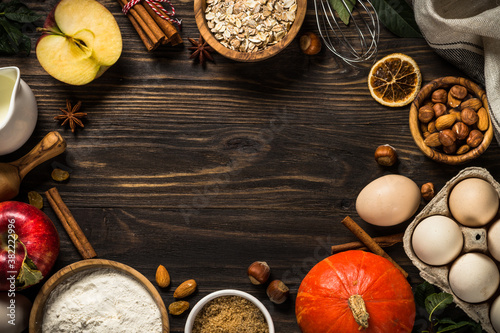 Fall baking ingredients on kitchen table. © nadianb