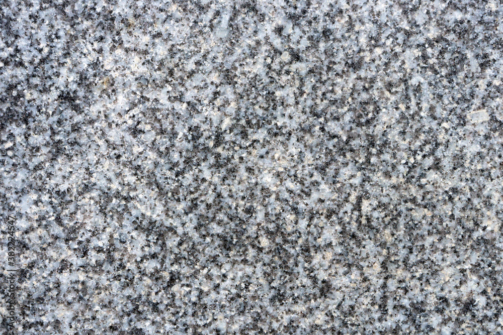 Polished black and white granite texture, architecture pattern. Texture of light granite with fine detail Polished black and white granite texture, architecture pattern. Texture of light granite with fine detail