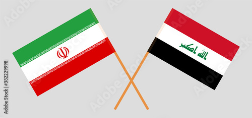 Crossed flags of Iraq and Iran