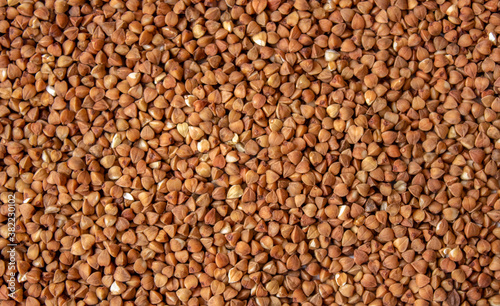 Buckwheat, buckwheat background, buckwheat texture, loose buckwheat