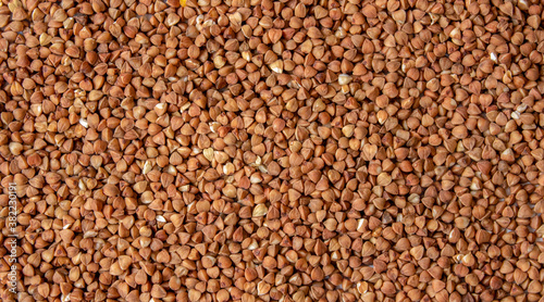 Buckwheat, buckwheat background, buckwheat texture, loose buckwheat