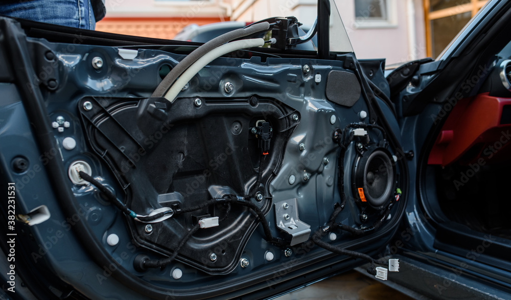 Fototapeta premium Interior part of a car door after restoration.