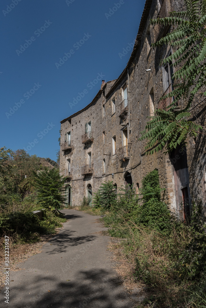 Apice Vecchio, a small ghost town in the province of Benevento. Wretched houses, collapsed buildings, closed and empty squares. Broken lanterns and abandoned shops