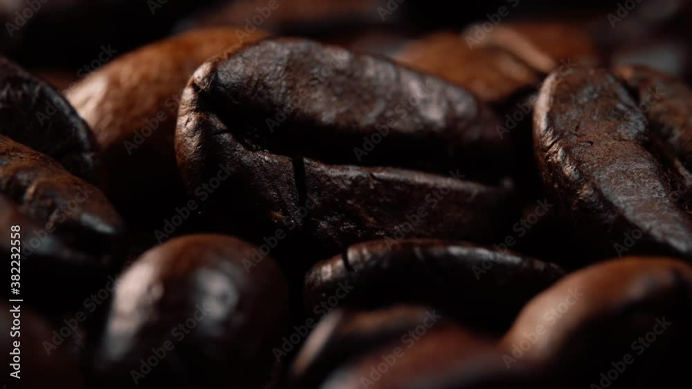 Macro view of freshly roasted coffee beans. Macro view of freshly roasted coffee beans.