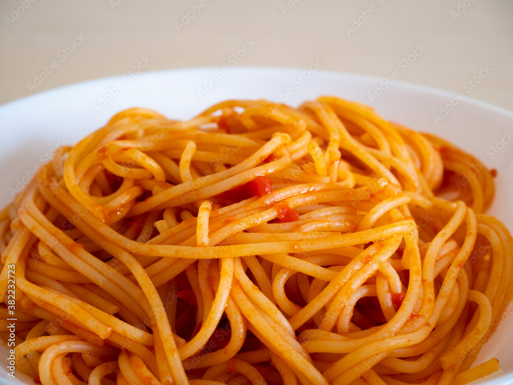 Spaghetti dish with tomato sauce, Italian pasta recipe, delicious traditional Italian dish, Mediterranean diet Spaghetti dish with tomato sauce, Italian pasta recipe, delicious traditional Italian dish, Mediterranean diet