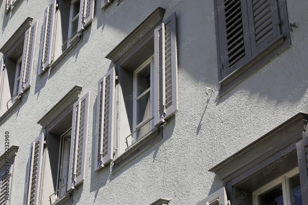 The facade with a windows and shutters The facade with a windows and shutters