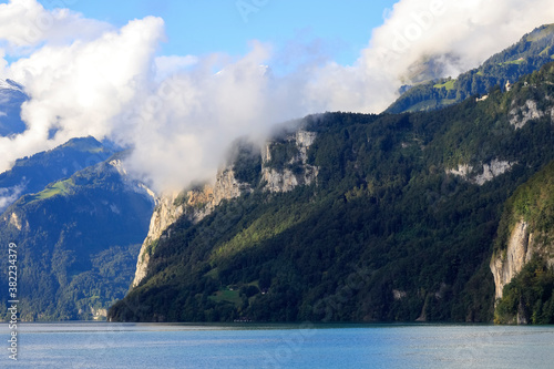 Clouds over magnificent mountains at Lake Luzerne