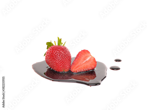 Strawberry in chocolate photo. Isolated in white background
