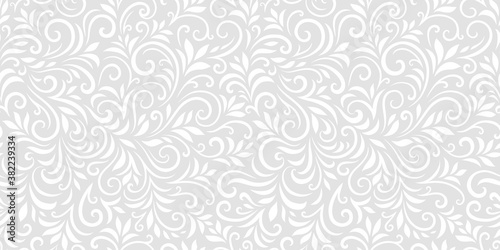 Vector seamless pattern with leaves and curls. Monochrome abstract floral background. Stylish monochrome texture.