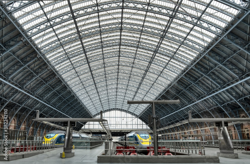 Eurostar Trains waiting on platforms in the 19th century wrought iron interior of St. Pancras Railway station, London, England, United Kingdom photo