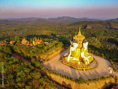 Aerial by drone of the huge sitting Buddhas, Ko Yin Lay, Pupawadoy Monastery near Ye, Mon state