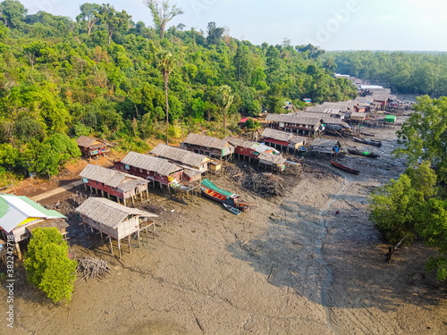 Aerial by drone of Fishing village on stilts in the mangroves of the Mergui (Myeik) Archipelago photo