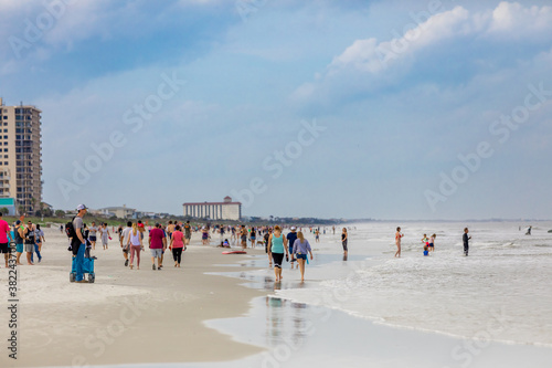 Crowds come to Jacksonville beach after it reopened during the Covid-19 Pandemic, Florida, United States of America photo