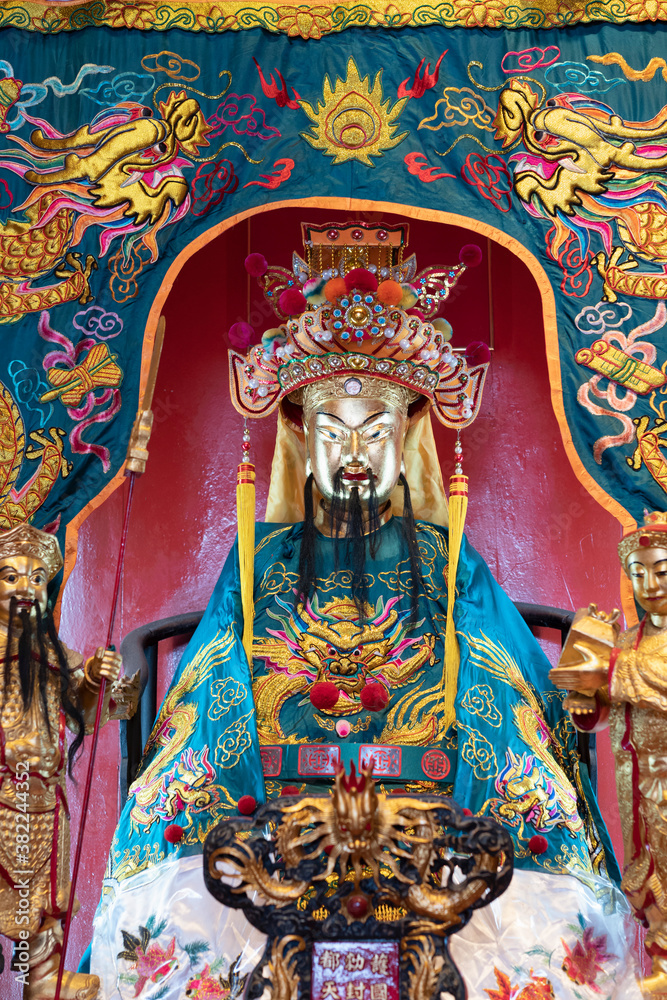 A shrine in the Guan Di Taoist Temple in Chinatown in the capital city of Kuala Lumpur, Malaysia A shrine in the Guan Di Taoist Temple in Chinatown in the capital city of Kuala Lumpur, Malaysia