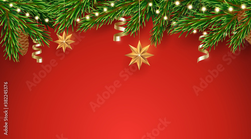 Vector fir tree border with a garland of light bulbs and hanging Christmas decorations. Horizontal red background with pine branches border. Traditional Xmas decor. Design element for winter holidays.