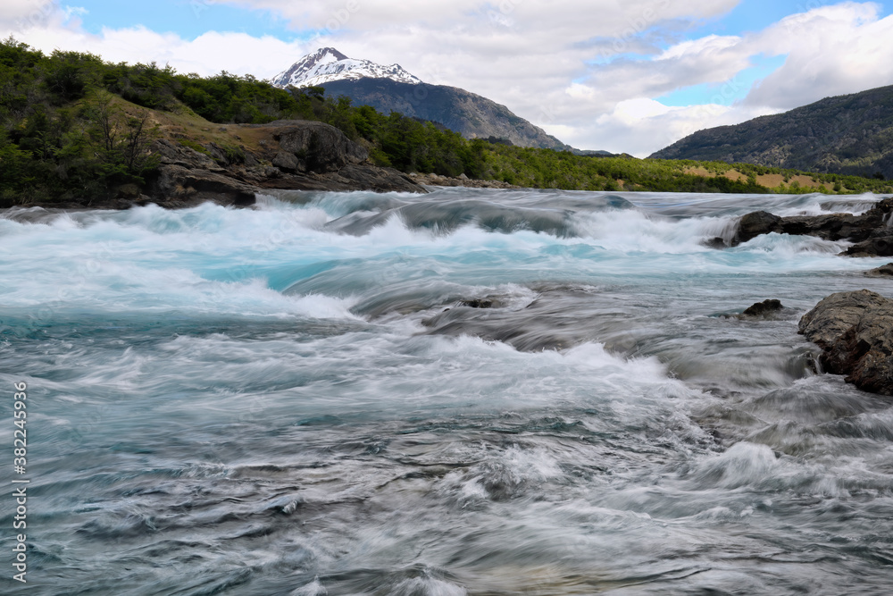 Confluence blue Baker River and grey Neff River, Pan-American between Cochrane and Puerto Guadal, Aysen Region, Patagonia, Chile Confluence blue Baker River and grey Neff River, Pan-American between Cochrane and Puerto Guadal, Aysen Region, Patagonia, Chile
