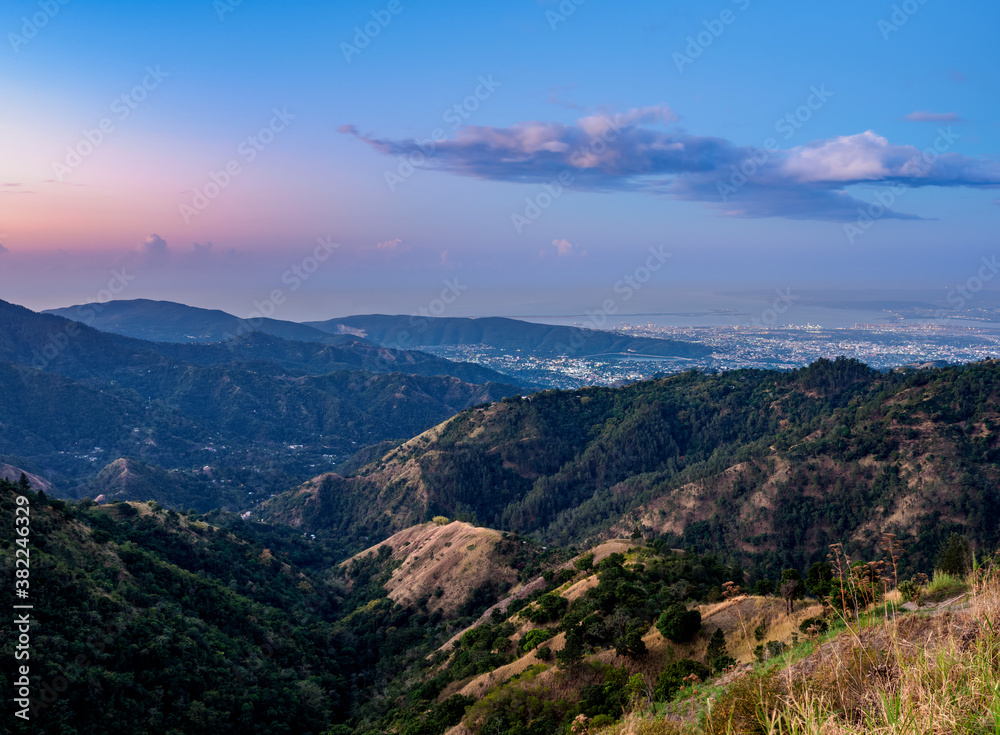 View over Blue Mountains towards Kingston at dawn, Saint Andrew Parish, Jamaica, West Indies, Caribbean, Central America View over Blue Mountains towards Kingston at dawn, Saint Andrew Parish, Jamaica, West Indies, Caribbean, Central America
